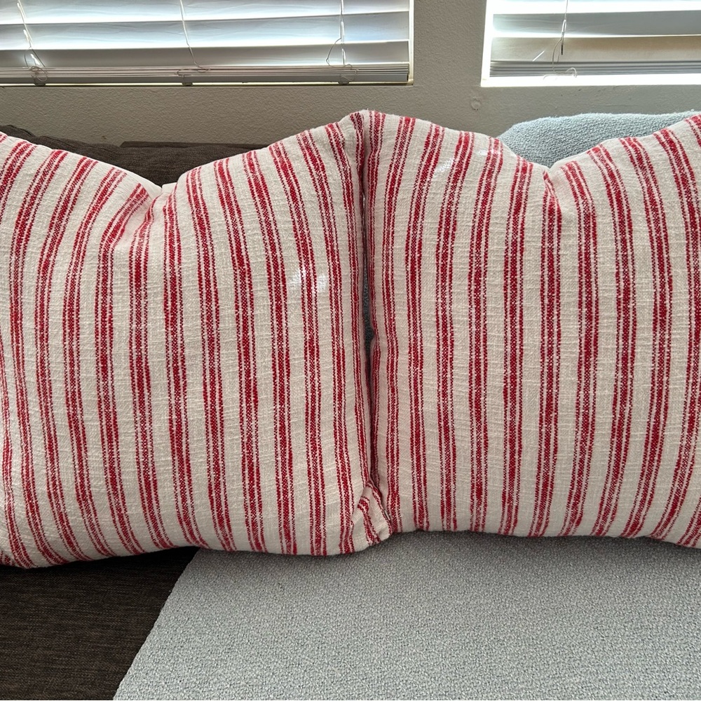 2 Red and White Striped Throw Pillows